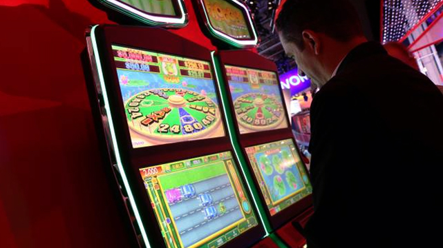 Gambler Playing Skill Based Slot Machine