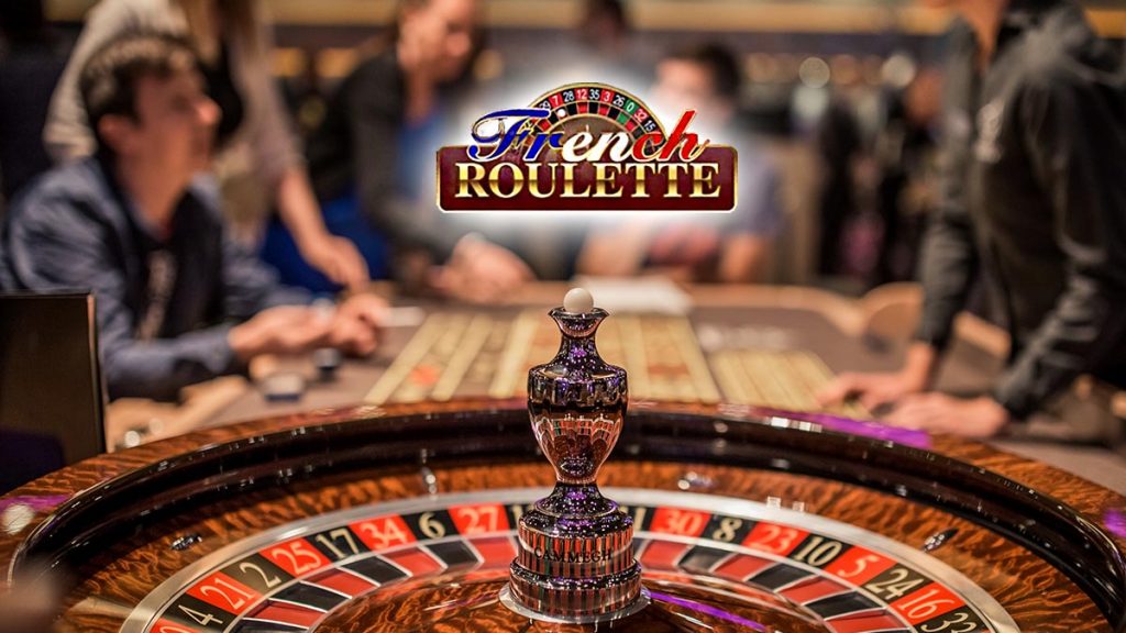 People Sitting at a French Roulette Table
