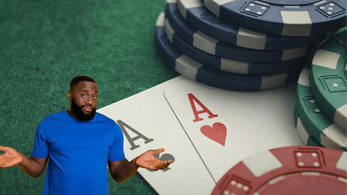 Pair of Aces on a Blackjack Table With a Man Shrugging in Front